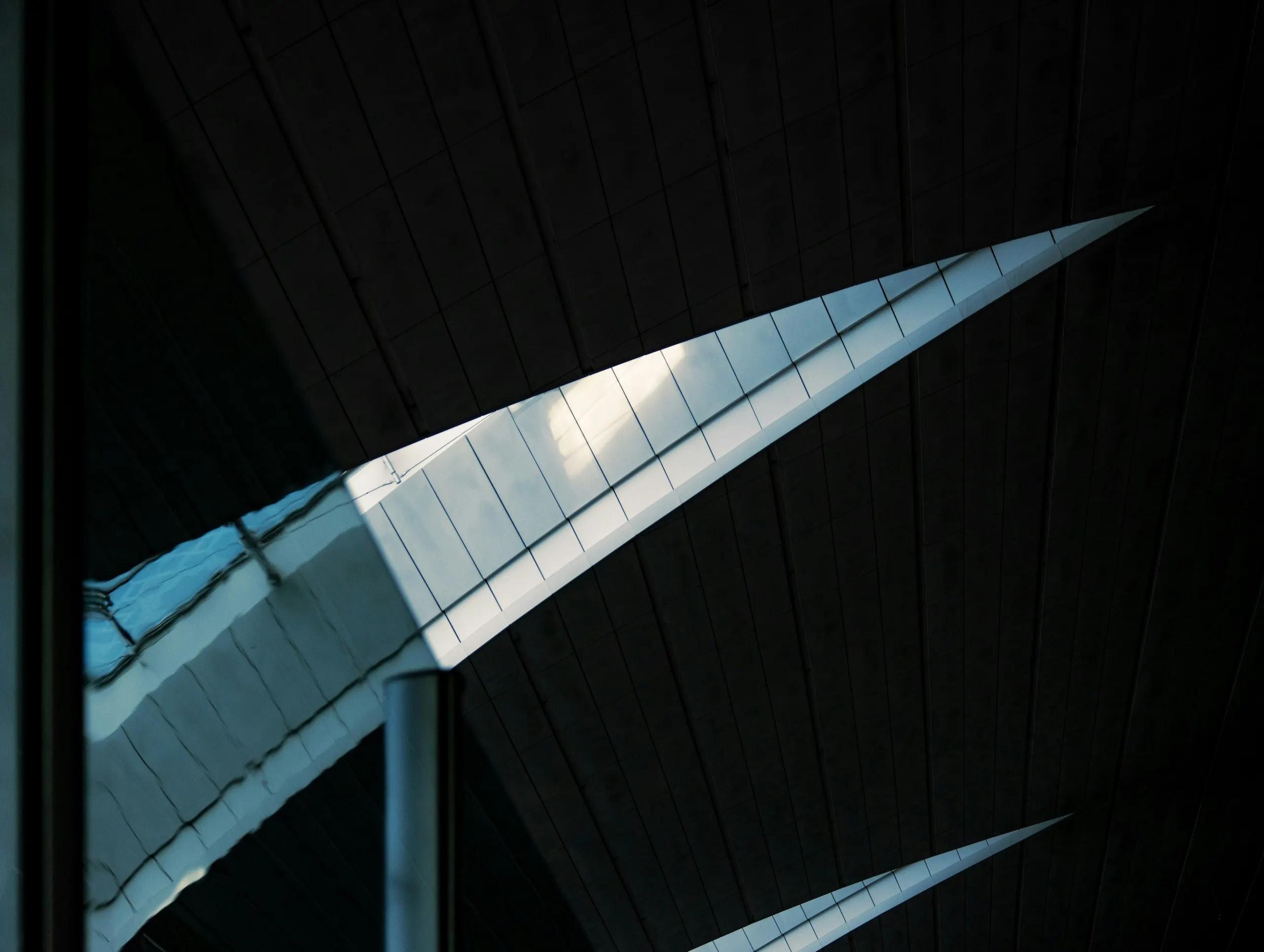 Ceiling of Dubai Airport seen through glass